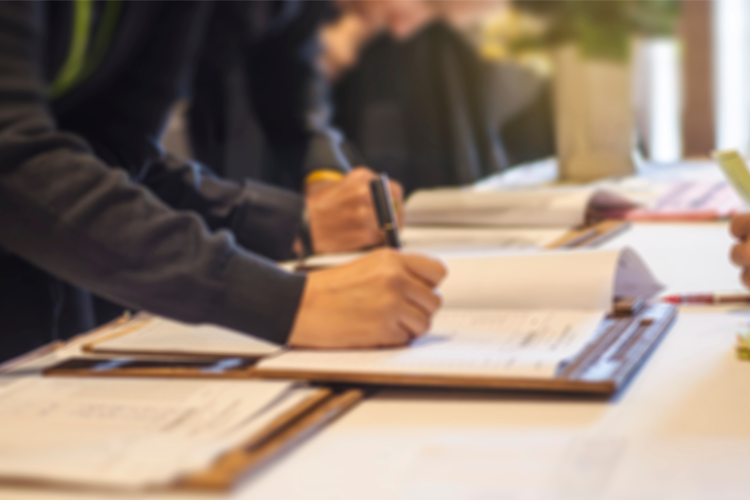 Photograph of person registering for a class.